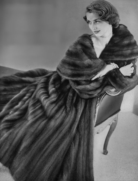 49571574346_3a4a9870ec_k Dorian Leigh in Maximilian fur coat at Holt, Renfrew & Co Ltd, Harper's Bazaar, October 1948.jpg