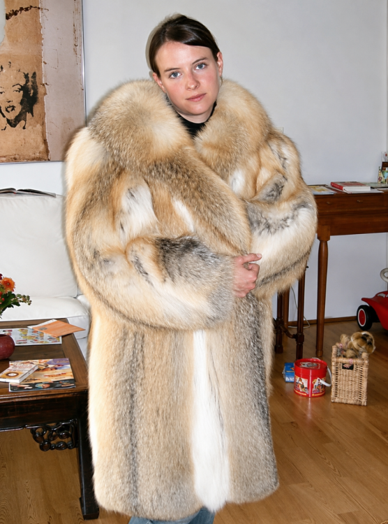 Luxurious coat in a cozy living room.png
